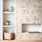 Elegant travertine mosaic fireplace wall showcasing timeless design and natural stone beauty in a minimalist living space.