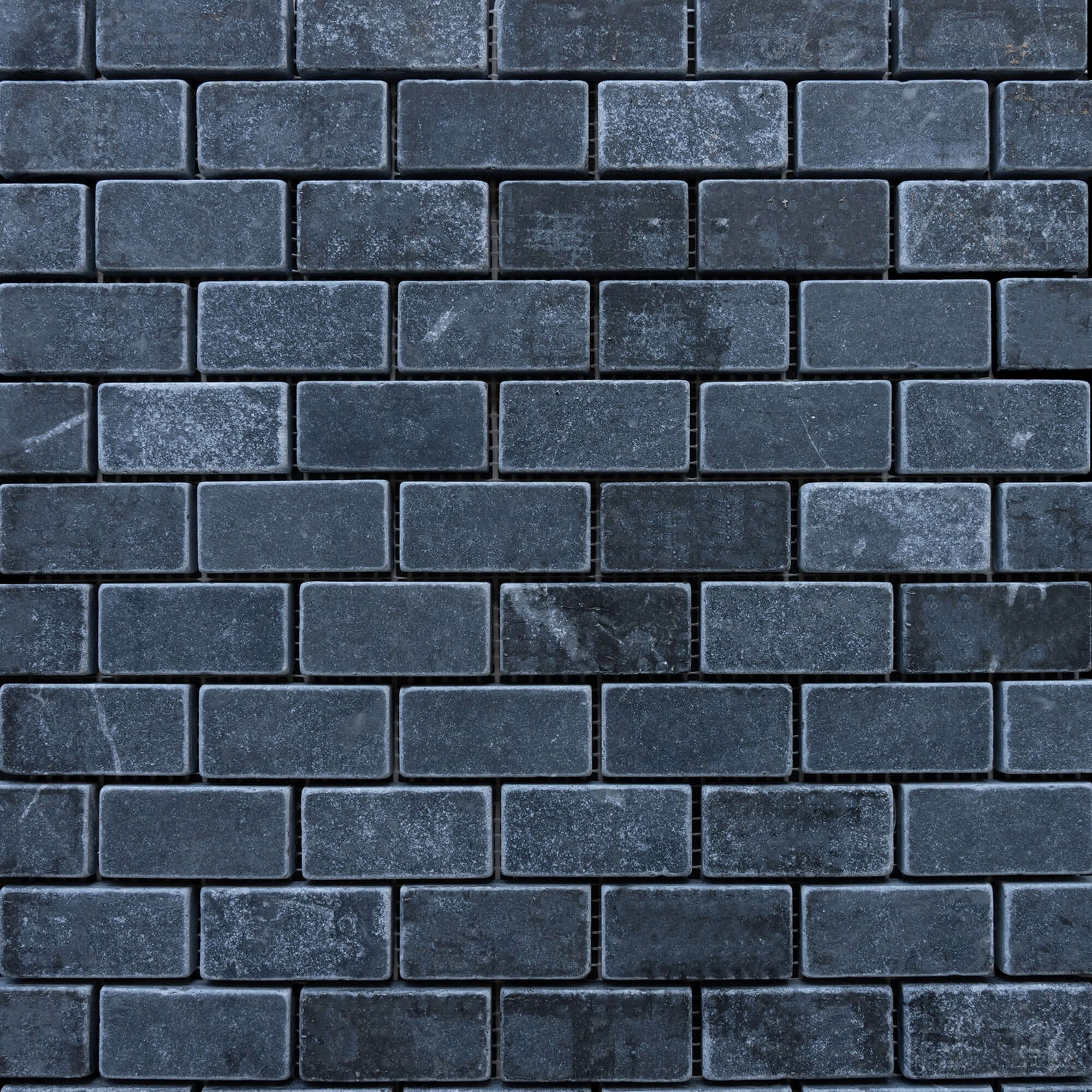 Black marble distressed mosaic tiles, showcasing a premium 3D texture and minimalist design for elegant interiors.